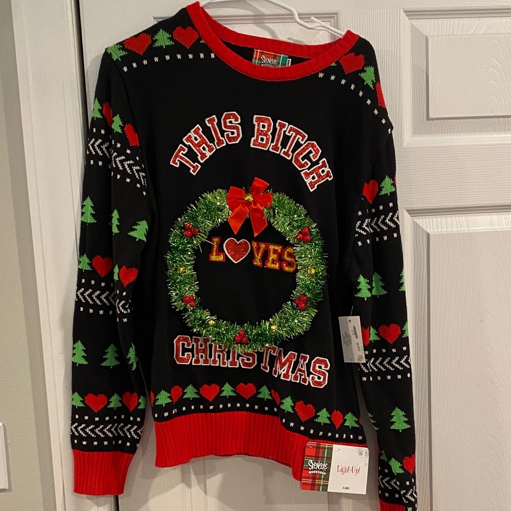 Spencer's Black Christmas Sweater with Wreath and Heart Design